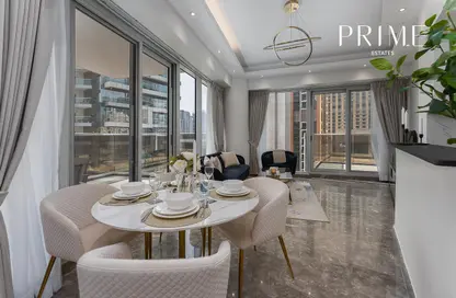 Living / Dining Room image for: Apartment - 2 Bedrooms - 2 Bathrooms for sale in Orra Harbour Residences and Hotel Apartments - Dubai Marina - Dubai, Image 1
