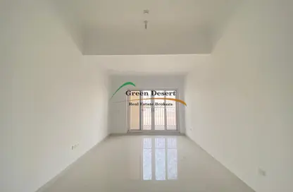 Empty Room image for: Apartment - 1 Bedroom - 2 Bathrooms for sale in Canal Residence - Dubai Sports City - Dubai, Image 1
