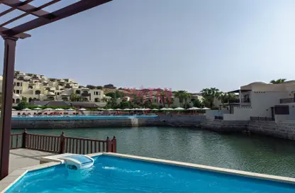 Pool image for: Villa - 2 Bedrooms - 2 Bathrooms for sale in The Cove Rotana - Ras Al Khaimah Waterfront - Ras Al Khaimah, Image 1