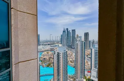 Outdoor Building image for: Apartment - 1 Bedroom - 2 Bathrooms for sale in 29 Burj Boulevard Tower 2 - 29 Burj Boulevard - Downtown Dubai - Dubai, Image 1