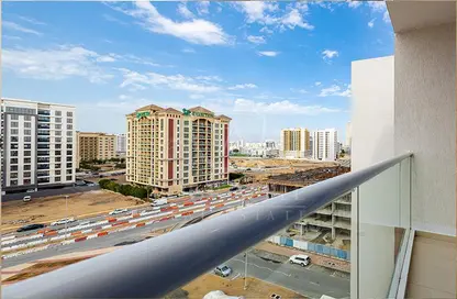 Balcony image for: Apartment - 1 Bedroom - 2 Bathrooms for sale in K1 - Dubai Residence Complex - Dubai, Image 1
