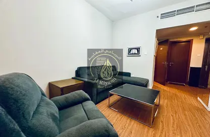 شقة - غرفة نوم - 2 حمامات للايجار في أورينت تاور 1 - أورينت تاور - البستان - عجمان