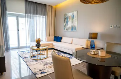 Living / Dining Room image for: Apartment - 1 Bedroom - 1 Bathroom for rent in DAMAC Majestine - Business Bay - Dubai, Image 1