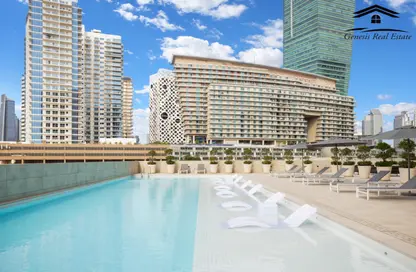 صورة لـ حوض سباحة شقة - غرفة نوم - 2 حمامات للبيع في رزيدينس 110 - الخليج التجاري - دبي ، صورة رقم 1