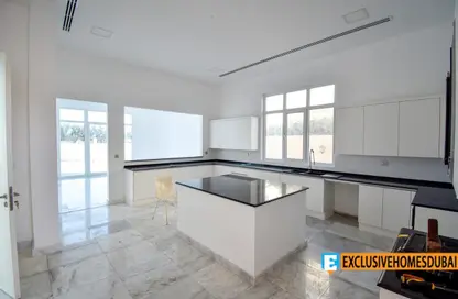صورة لـ مطبخ فيلا - 6 غرف نوم - 7 حمامات للبيع في بونداروسا - الفيلا - دبي ، صورة رقم 1