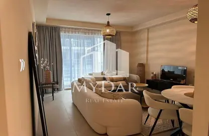 Living / Dining Room image for: Apartment - 1 Bedroom - 2 Bathrooms for sale in Pacific - Al Marjan Island - Ras Al Khaimah, Image 1