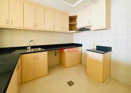 صورةمطبخ لـ: شقة - 1 غرفة نوم - 2 حمامات للكراء في مبنى 1 - 37 - زين - ديسكوفري غاردنز - دبي, صورة 1