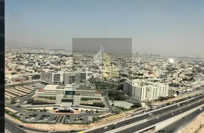 Office Space - Studio - 4 Bathrooms for rent in I Rise Tower - Barsha Heights (Tecom) - Dubai