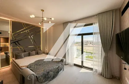 Room / Bedroom image for: Apartment - 1 Bathroom for rent in Laya Heights - Dubai Studio City - Dubai, Image 1