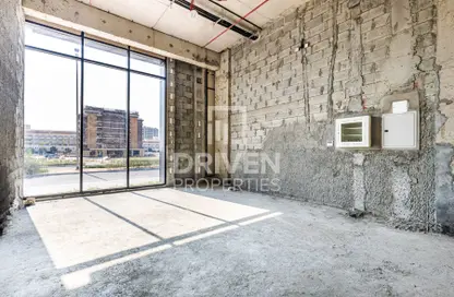 Empty Room image for: Retail - Studio for rent in Midtown Central Majan - Majan - Dubai, Image 1
