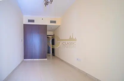 Room / Bedroom image for: Apartment - 1 Bedroom - 2 Bathrooms for rent in Mazaya 29 - Queue Point - Dubai Land - Dubai, Image 1