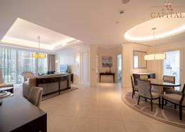 صورةغرفة المعيشة / غرفة الطعام لـ: شقة - 2 غرف نوم - 3 حمامات للكراء في فندق العنوان - بوليفارد - دبي وسط المدينة - دبي, صورة 1