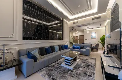 Living Room image for: Apartment - 4 Bedrooms - 5 Bathrooms for sale in Nasayem Avenue - Mirdif Hills - Mirdif - Dubai, Image 1