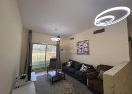 Living Room image for: Apartment - 1 bedroom - 2 bathrooms for rent in Golf Apartments - Al Hamra Village - Ras Al Khaimah, Image 1