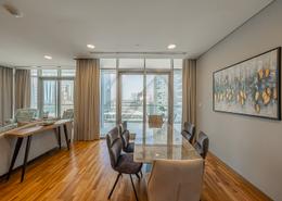 صورةغرفة المعيشة / غرفة الطعام لـ: شقة - 3 غرف نوم - 3 حمامات للبيع في برج ضمان - مركز دبي المالي العالمي - دبي, صورة 1