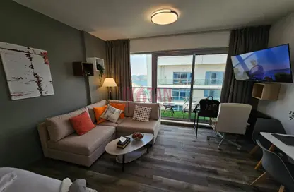 Living Room image for: Apartment - 1 Bathroom for rent in Pacific Bora Bora - Pacific - Al Marjan Island - Ras Al Khaimah, Image 1