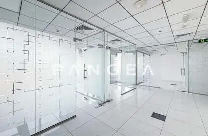 Office Space - Studio - 1 Bathroom for rent in The Prism - Business Bay - Dubai