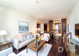 Living / Dining Room image for: Apartment - 1 bedroom - 2 bathrooms for sale in Burj Khalifa - Burj Khalifa Area - Downtown Dubai - Dubai, Image 1