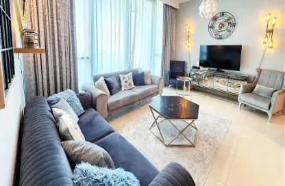 Living Room image for: Apartment - 1 Bedroom - 2 Bathrooms for sale in Downtown Views - Downtown Dubai - Dubai, Image 1