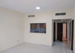 Empty Room image for: Apartment - 1 Bedroom - 2 Bathrooms for sale in U04 - Italy Cluster - International City - Dubai, Image 1