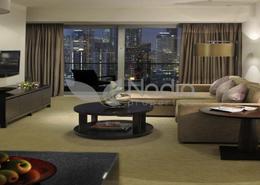 Living Room image for: Apartment - 1 bedroom - 1 bathroom for sale in The Address Dubai Marina - Dubai Marina - Dubai, Image 1