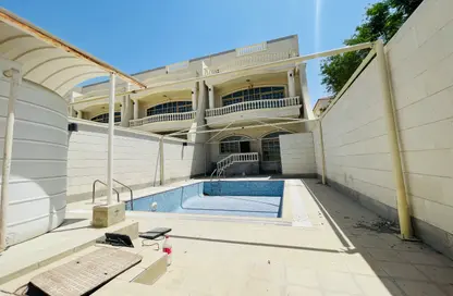 Villa - 6 Bedrooms - 7+ Bathrooms for rent in Mohamed Bin Zayed Centre - Mohamed Bin Zayed City - Abu Dhabi
