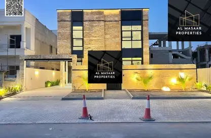 Villa - 5 Bedrooms - 7 Bathrooms for sale in Ajman Hills - Al Alia - Ajman