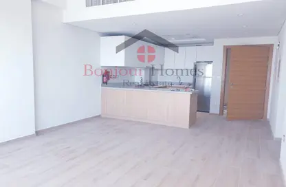 Kitchen image for: Apartment - 1 Bedroom - 2 Bathrooms for rent in Azizi Aura - Downtown Jebel Ali - Dubai, Image 1