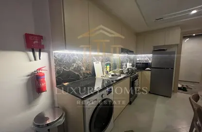 صورة لـ مطبخ شقة - غرفة نوم - 1 حمام للبيع في بن غاطي افنيو - الجداف - دبي ، صورة رقم 1