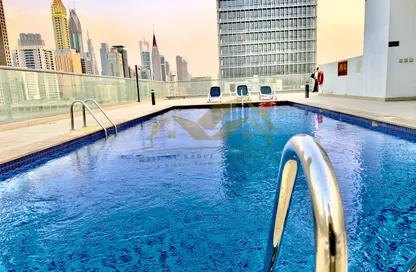 Apartment - 1 Bedroom - 2 Bathrooms for rent in Jumeirah Garden City - Al Satwa - Dubai