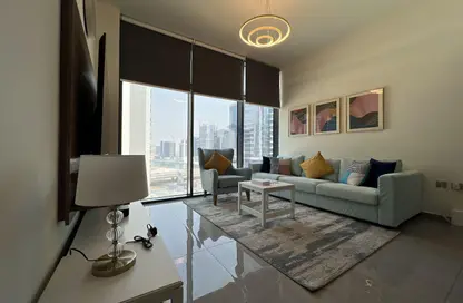 صورة لـ غرفة المعيشة شقة - 2 غرف نوم - 2 حمامات للبيع في برج ميرانو - الخليج التجاري - دبي ، صورة رقم 1