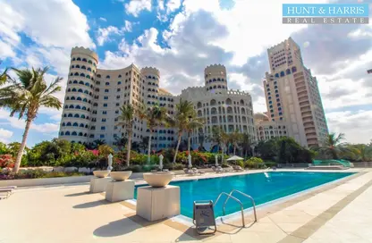 Pool image for: Apartment - 1 Bathroom for sale in Al Hamra Palace Beach Resort - Al Hamra Village - Ras Al Khaimah, Image 1