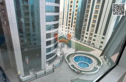 شقة - غرفة نوم - 2 حمامات للايجار في أورينت تاور 1 - أورينت تاور - البستان - عجمان