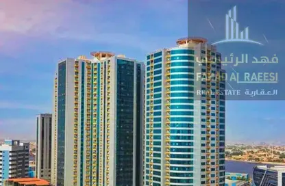 شقة - غرفة نوم - 2 حمامات للبيع في أورينت تاور 2 - أورينت تاور - البستان - عجمان