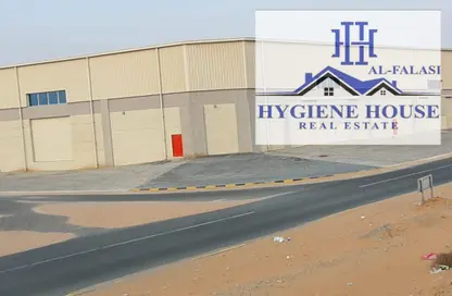 صورة لـ مبنى خارجي مستودع - استوديو - 2 حمامات للايجار في منطقة الإمارات الصناعية الحديثة - أم القيوين ، صورة رقم 1