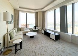 صورةغرفة المعيشة لـ: شقة - 1 غرفة نوم - 1 حمام للكراء في برج النخيل - نخلة الجميرا - دبي, صورة 1