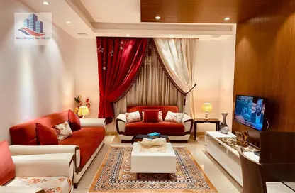 Living Room image for: Apartment - 2 Bedrooms - 3 Bathrooms for rent in New Al Taawun Road - Al Taawun - Sharjah, Image 1