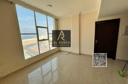 Apartment - 1 Bedroom - 1 Bathroom for rent in Corniche Tower - Ajman Corniche Road - Ajman