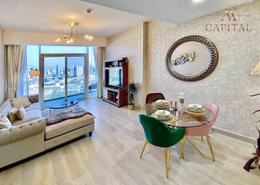 Living / Dining Room image for: Apartment - 1 bedroom - 1 bathroom for rent in Bloom Towers B - Bloom Towers - Jumeirah Village Circle - Dubai, Image 1
