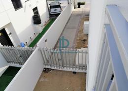 Outdoor Building image for: Townhouse - 3 bedrooms - 5 bathrooms for sale in Zinnia - The Roots DAMAC Hills 2 - Damac Hills 2 - Dubai, Image 1