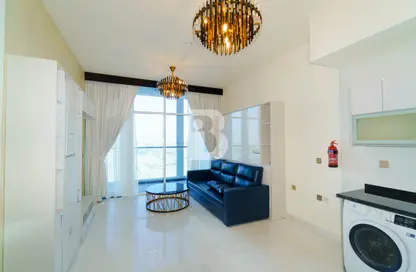 صورة لـ غرفة المعيشة شقة - 1 حمام للبيع في بيز من دانوب - الخليج التجاري - دبي ، صورة رقم 1
