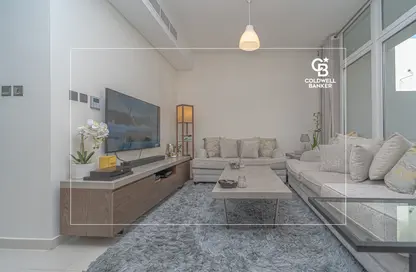 Living Room image for: Apartment - 3 Bedrooms - 3 Bathrooms for rent in Albizia - Damac Hills 2 - Dubai, Image 1