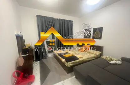 Living / Dining Room image for: Apartment - 2 Bedrooms - 2 Bathrooms for sale in Oasis Tower - Al Rashidiya 1 - Al Rashidiya - Ajman, Image 1