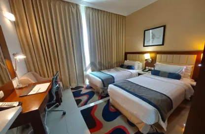 شقة - 2 غرف نوم - 2 حمامات للايجار في تريبان للاجنحة الفندقية لفخر الدين - مدينة دبي الرياضية - دبي
