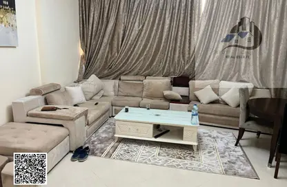 شقة - غرفة نوم - 2 حمامات للايجار في أورينت تاور 1 - أورينت تاور - البستان - عجمان