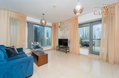 Living Room image for: Apartment - 2 Bedrooms - 3 Bathrooms for rent in 29 Burj Boulevard Tower 2 - 29 Burj Boulevard - Downtown Dubai - Dubai, Image 1