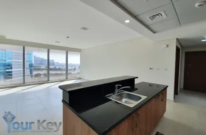 Kitchen image for: Apartment - 1 Bedroom - 2 Bathrooms for rent in Al Dana Tower - Danet Abu Dhabi - Abu Dhabi, Image 1