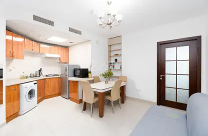 صورة لـ مطبخ شقة - غرفة نوم - 1 حمام للبيع في بوابة دبي الجديدة 1 - بحيرة إلوشيو - أبراج بحيرة الجميرا - دبي ، صورة رقم 1