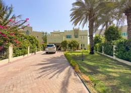 Garden image for: Villa - 4 bedrooms - 5 bathrooms for rent in Entertainment Foyer - European Clusters - Jumeirah Islands - Dubai, Image 1