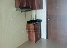 Kitchen image for: Studio - 1 bathroom for rent in Remal Tower - Jumeirah Village Circle - Dubai, Image 1